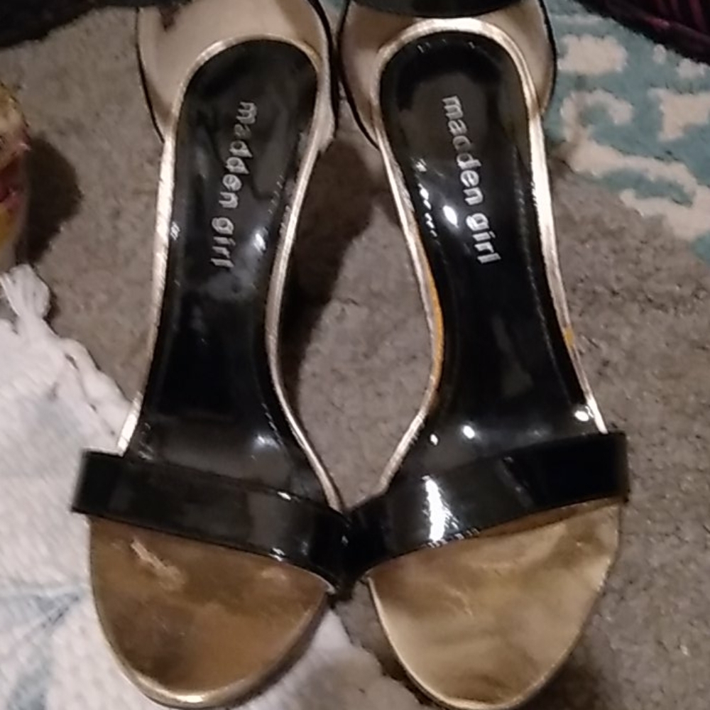 High heels,  shine black with gold trim